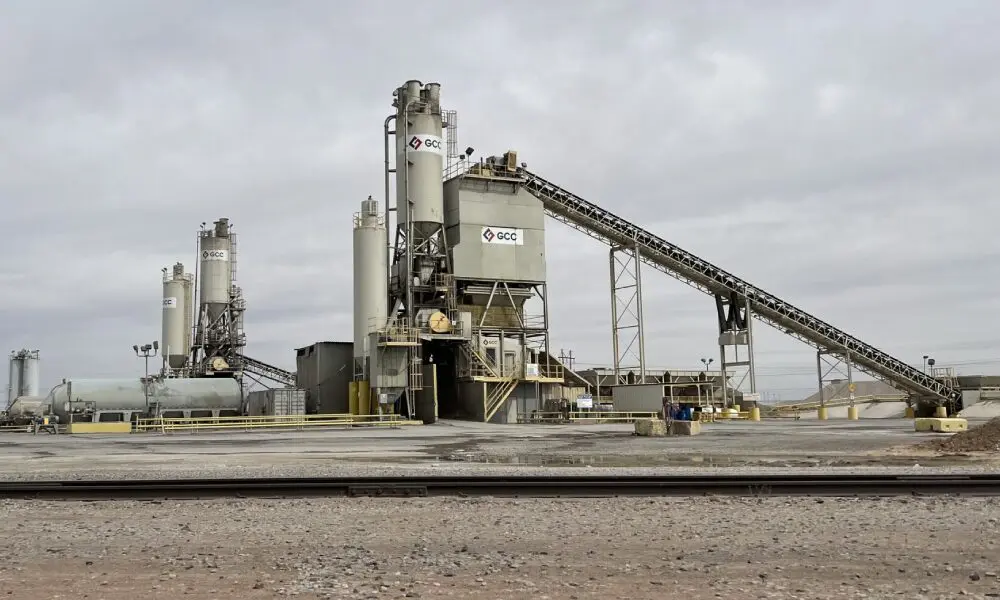 A cement plant with many workers on it