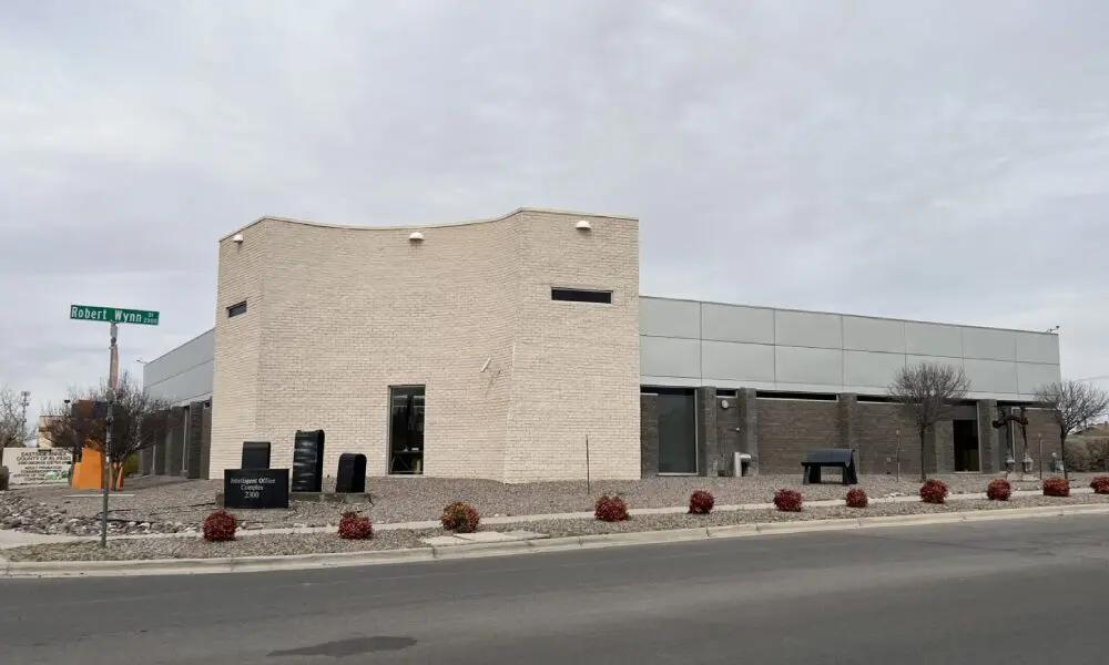 A building with a street in front of it