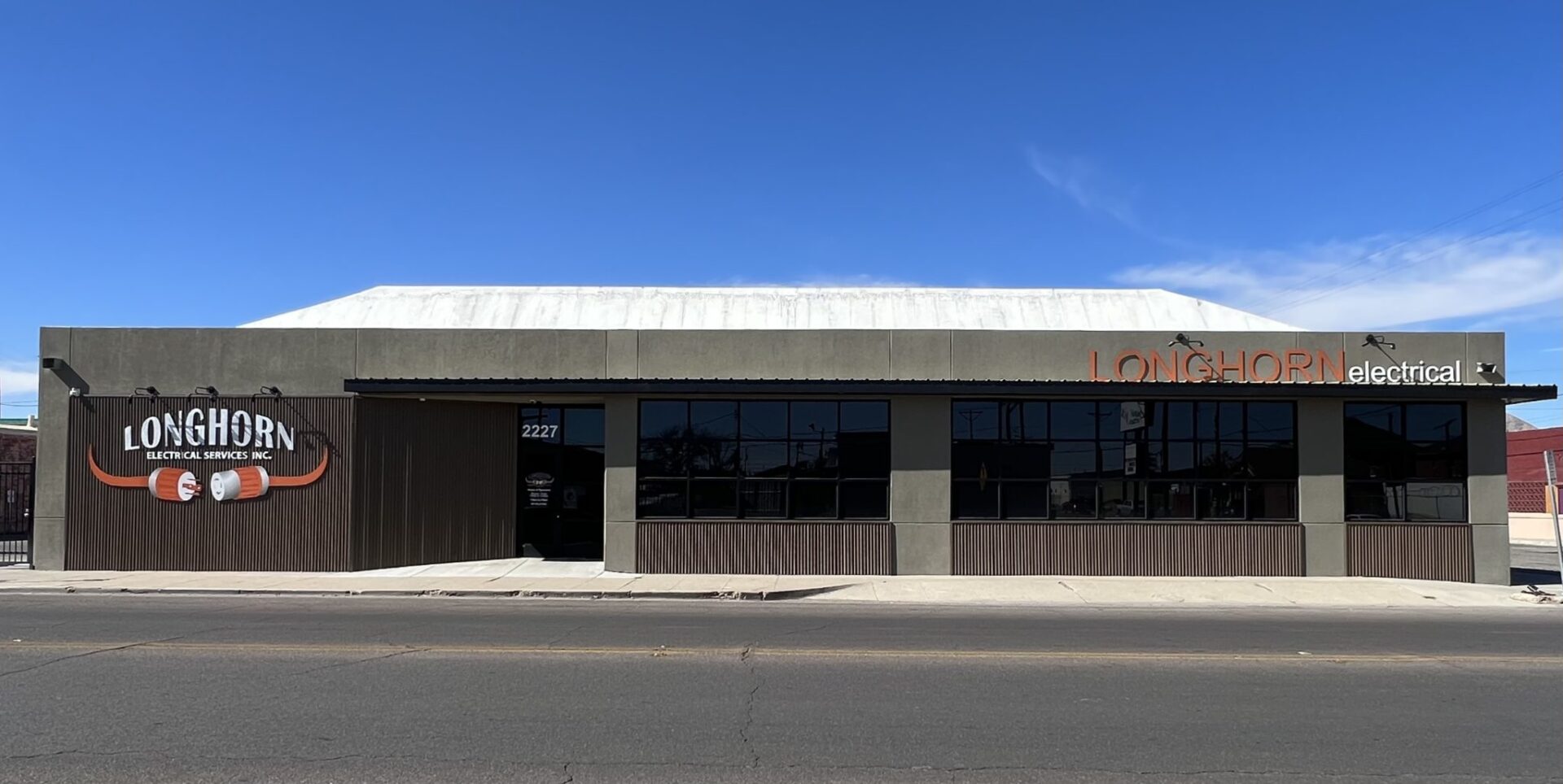 A building with a large window on the side of it.